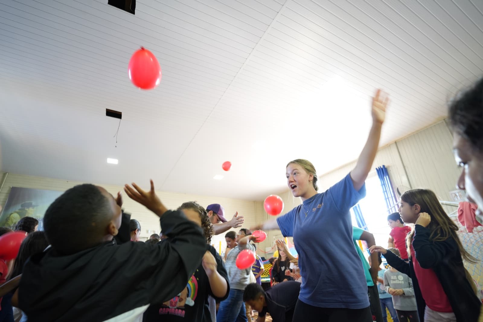 A DTS student serving children during an outreach activity